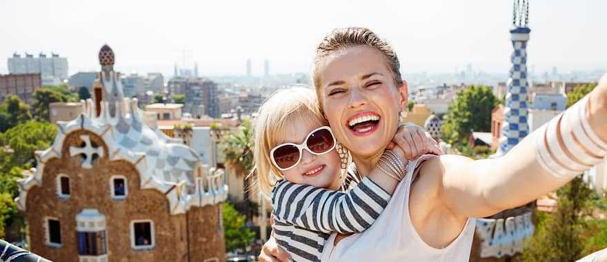 Mother and daughter and Park Guell in Barcelona, Spain