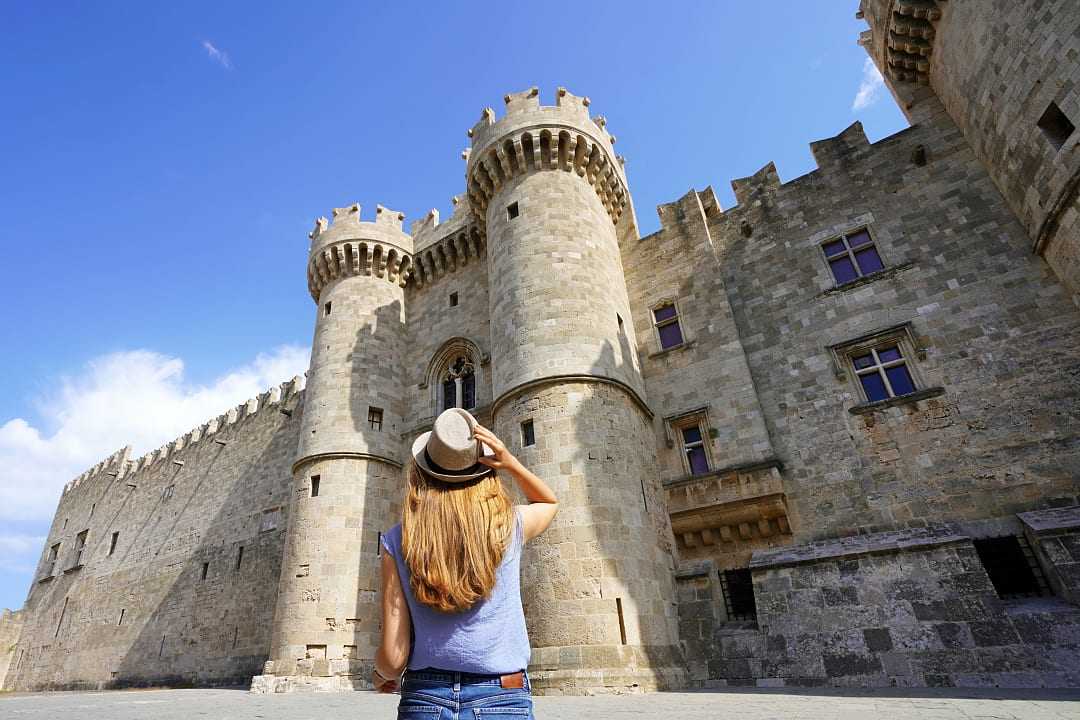 Woman visiting the Palace of the Grand Master of the Knights in Rhodes, Greece