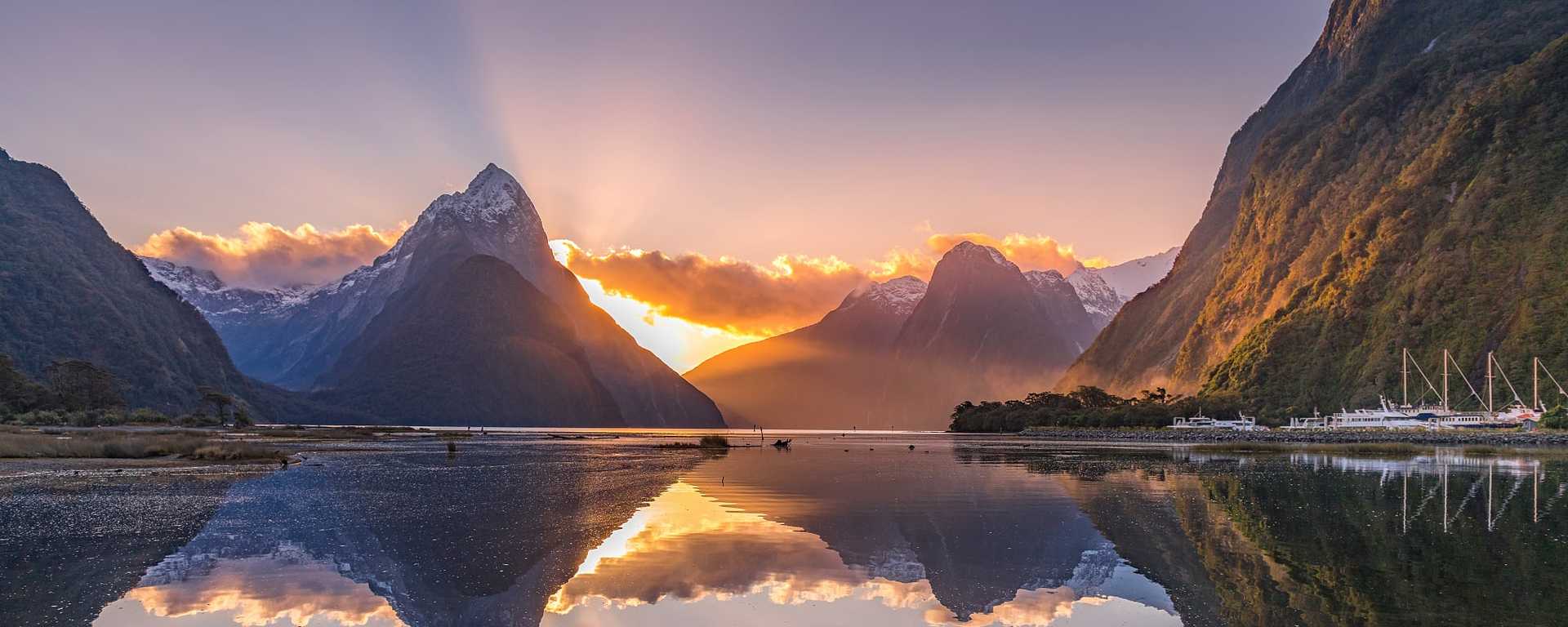 The sun bend Mitre Peak in Milford Sound, New Zealand