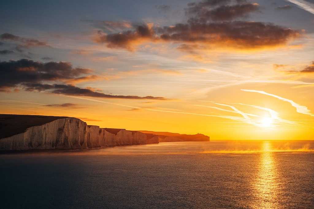 Sunrise over Seven Sisters chalk cliffs in East Sussex, England
