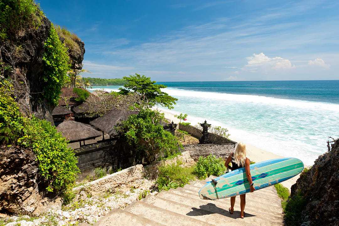 Surfer at a beach in Bali