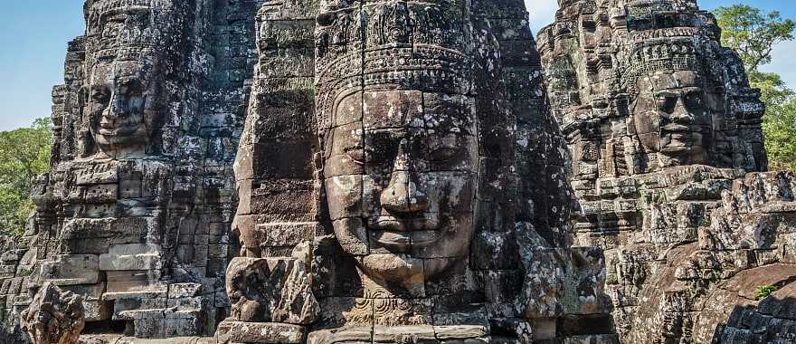 Ancient stone faces of the Bayon Temple at at Angkor in Cambodia