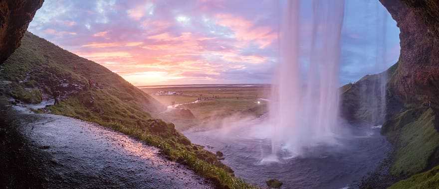 Experience a behind-the-scenes look at the glorious waterfall of Seljalandsfoss in Iceland