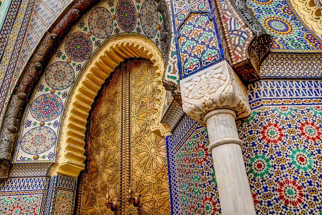 Intricate tile patterns, metal work and plaster carvings in Fez, Morocco
