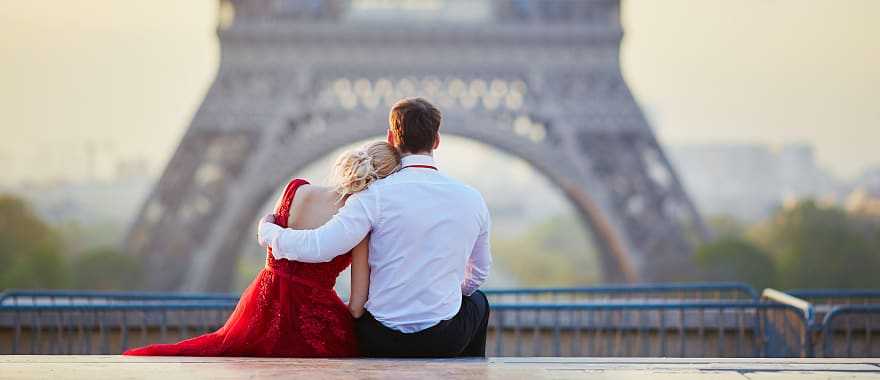 Couple overlooking the Eiffel Tower in Paris, France