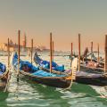 A row of gondolas in Venice, Italy. 