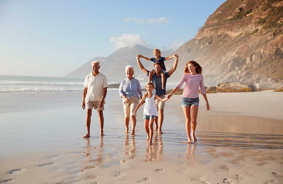 Family on Cape Town beach where curiosity is activated rather than managed.