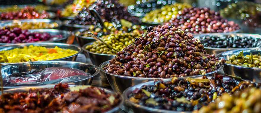Discover the Flavors of Israel: 9-Day Culinary Tour Olives for sale at Sarona Market in Tel-Aviv, Israel