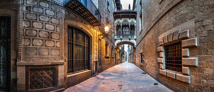 Street lights illuminate balconies in the Gothic Quarter, Barcelona, Spain