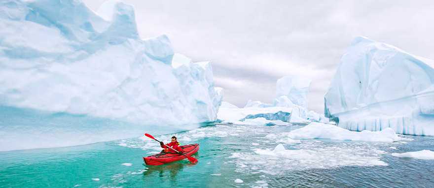 Kayaking in Antarctica Kayaking around icebergs in Antarctica