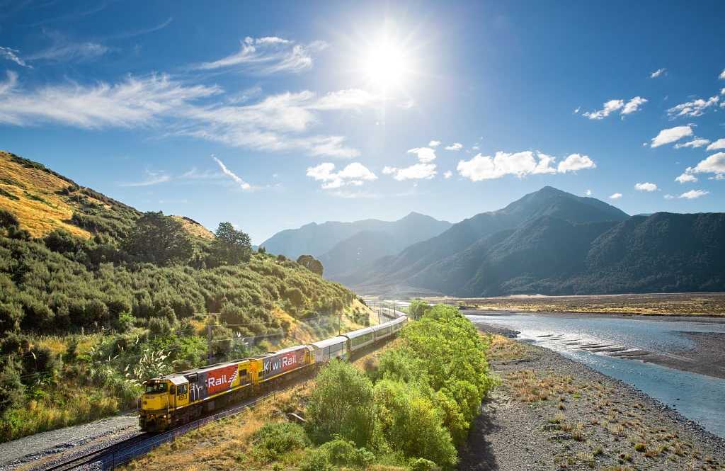 TranzAlpine along Waimakariri River in New Zealand.  Photo courtesy KiwiRail