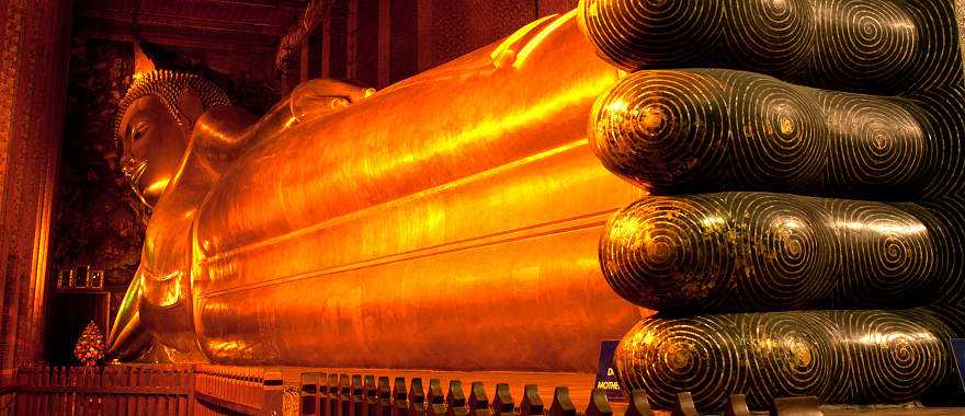 Golden reclining Buddha in Bangkok, Thailand.