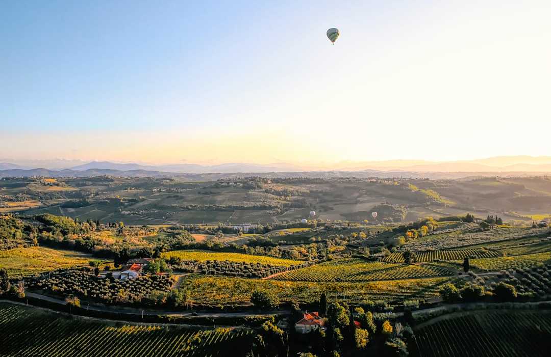 Tuscany, Italy Sunrise hot air balloon ride over the vineyards of Tuscany, Italy