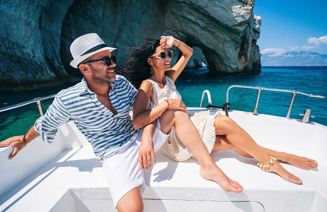 Greece Couple on a luxury yacht sailing the islands in Greece