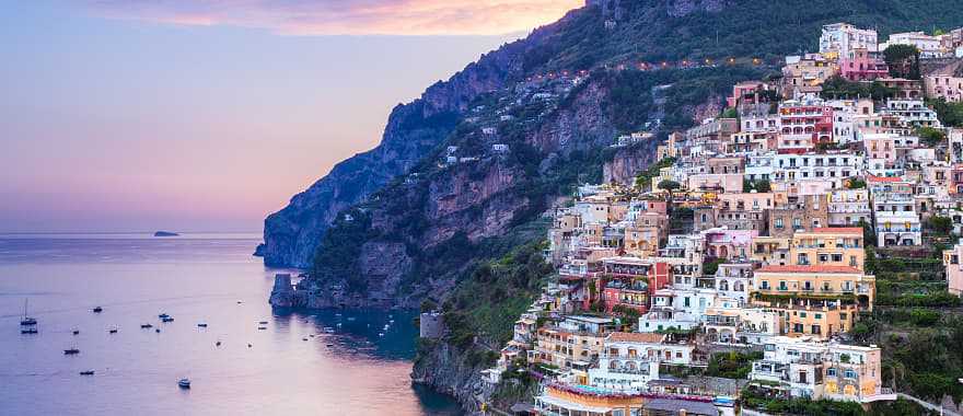 Hillside town of Positano looking out to the mediterranean at sunset in Italy's Amalfi Coast