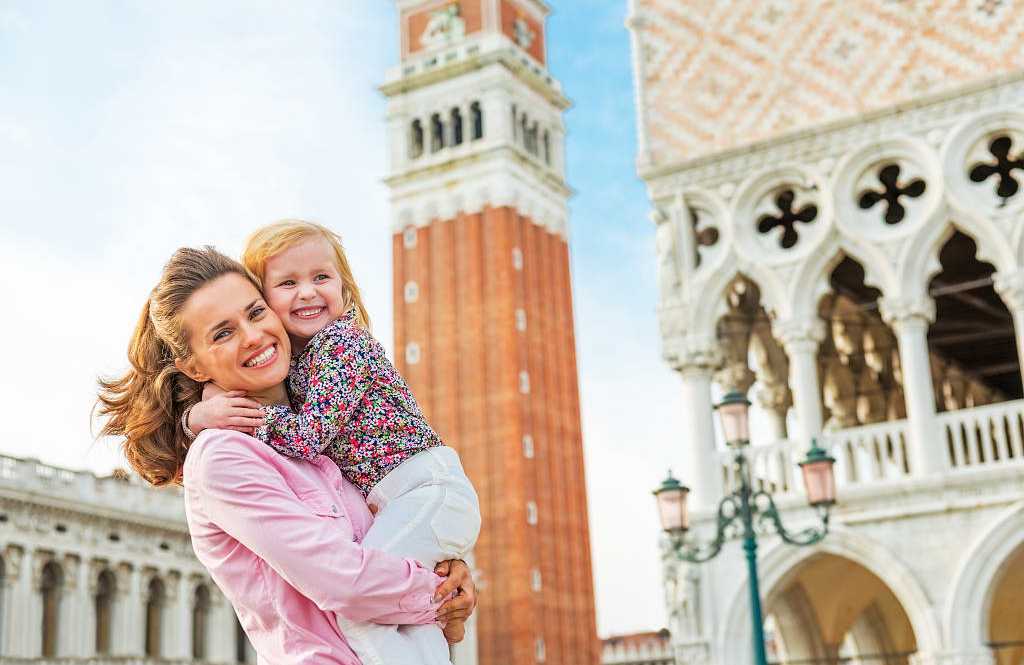 Piazza San Marco, Venice Mother and daughter in Piazza San Marco, Venice