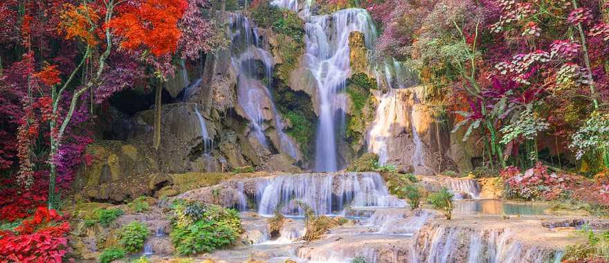 Beautiful autumn colors surround Kuang Si Waterfall in Luang Prabang, Laos.