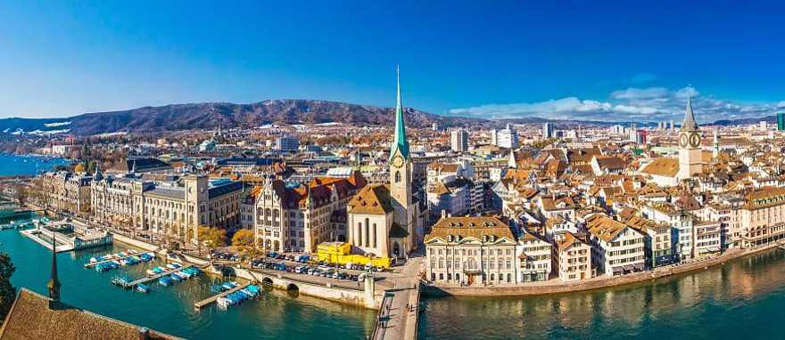 Historic city center of Zurich with famous Fraumünster church and the Limmat river in Switzerland Historic city center of Zurich with famous Fraumünster church and the Limmat river in Switzerland