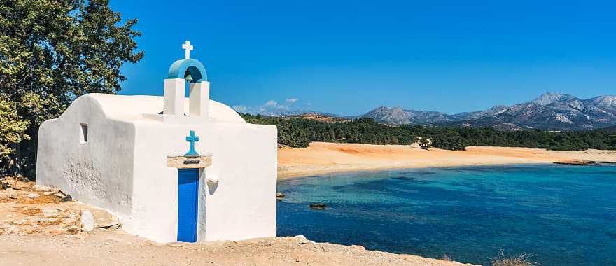 Chapel on Aliko Beach in Naxos Island, Greece.