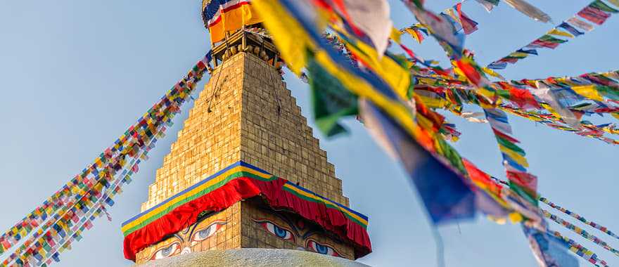 Boudhanath Stupa with prayer flags in Kathmandu, Nepal.