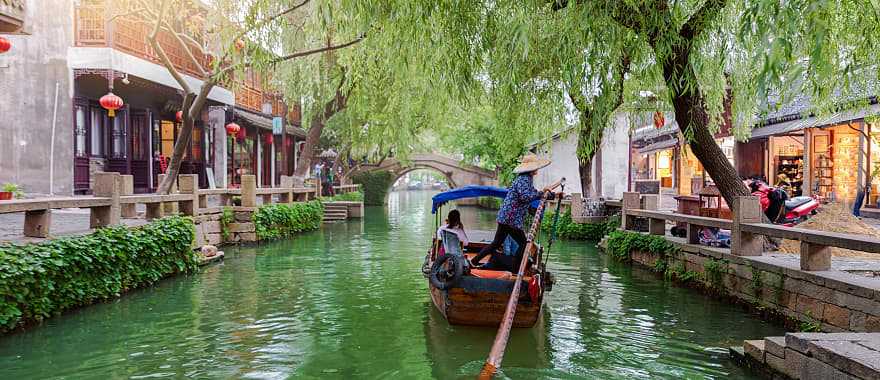 Gondola runs on the canals near Shanghai in China.