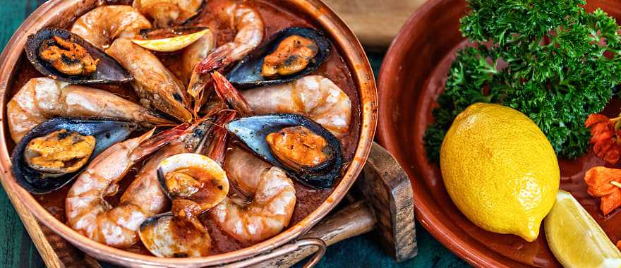 Seafood Cataplana, traditional Portuguese stew served in the Algarve region of Portugal