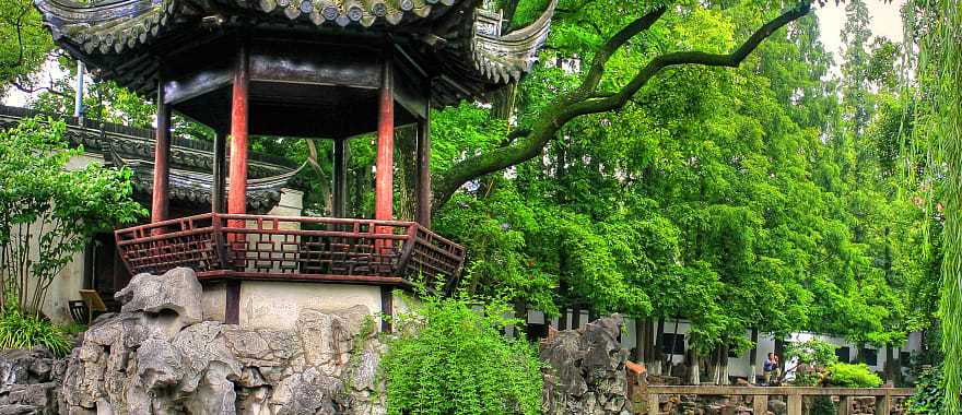 Shanghai Yu Yuan Gardens, along the calm waters and winding forest paths, China