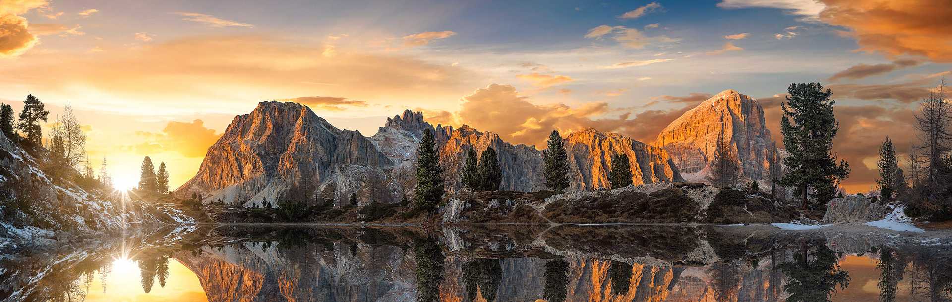 Amazing autumn sunset over Lago di Limides in the Dolomites, Italy.