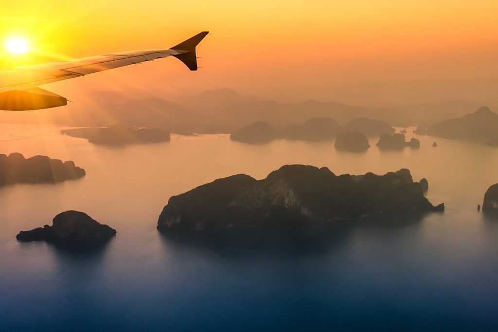 Flying over Phang Nga Bay at sunset