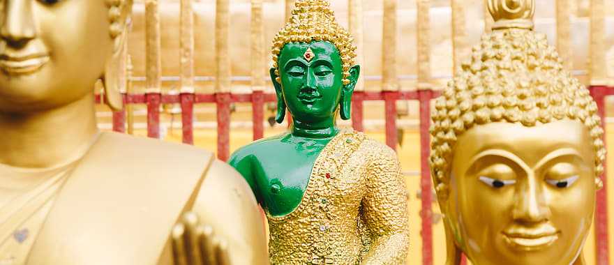 Statues in the golden Temple in Thailand