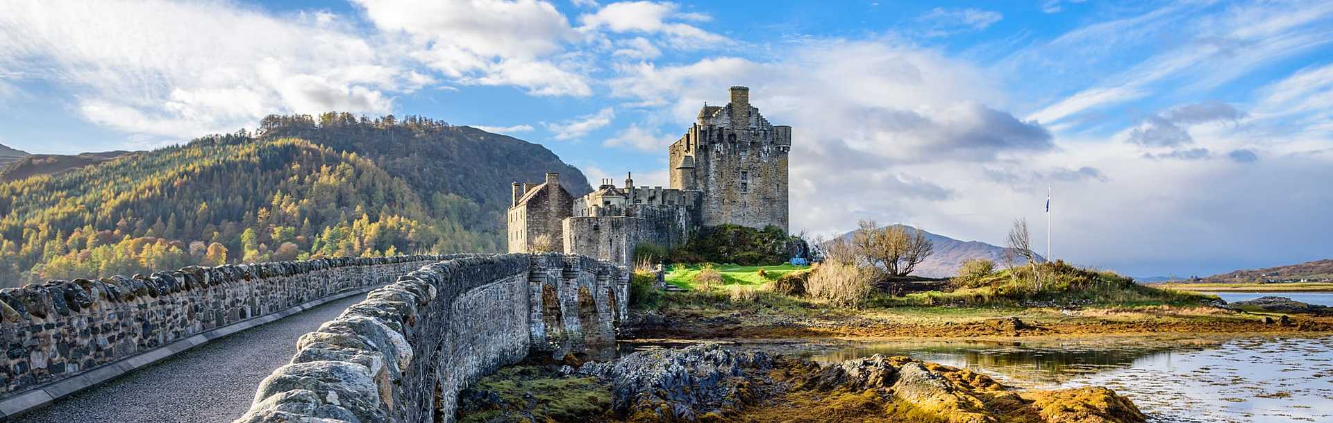 Eilean Donan castle on a sunny autumn day in Scotland.
