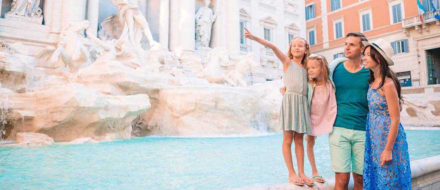 Family at at Trevi Fountain in Rome, Italy