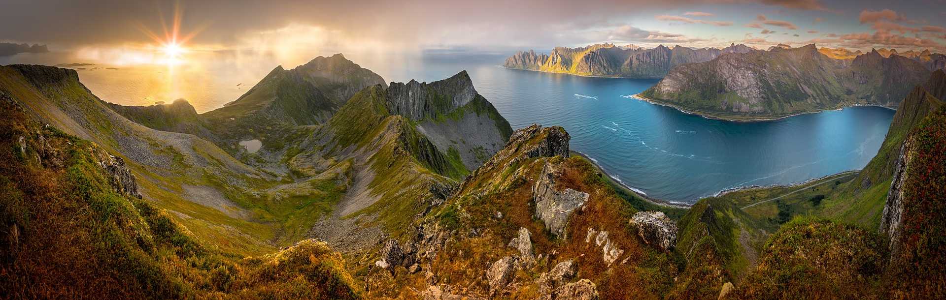 Panoramic View from Husfjellet Mountain on Senja Island during autumn sunset in Norway.