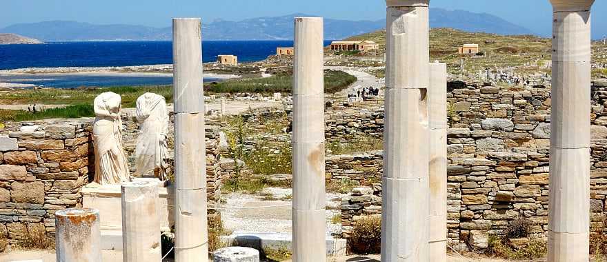 Ruins and remains of marble statues on the island of Delos, Greece