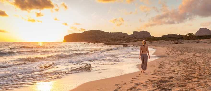 Romantic Greece Getaway: Athens, Santorini & Crete - Walking along Falasnara Beach at sunset in Western Crete Romantic Greece Getaway: Athens, Santorini & Crete - Walking along Falasnara Beach at sunset in Western Crete