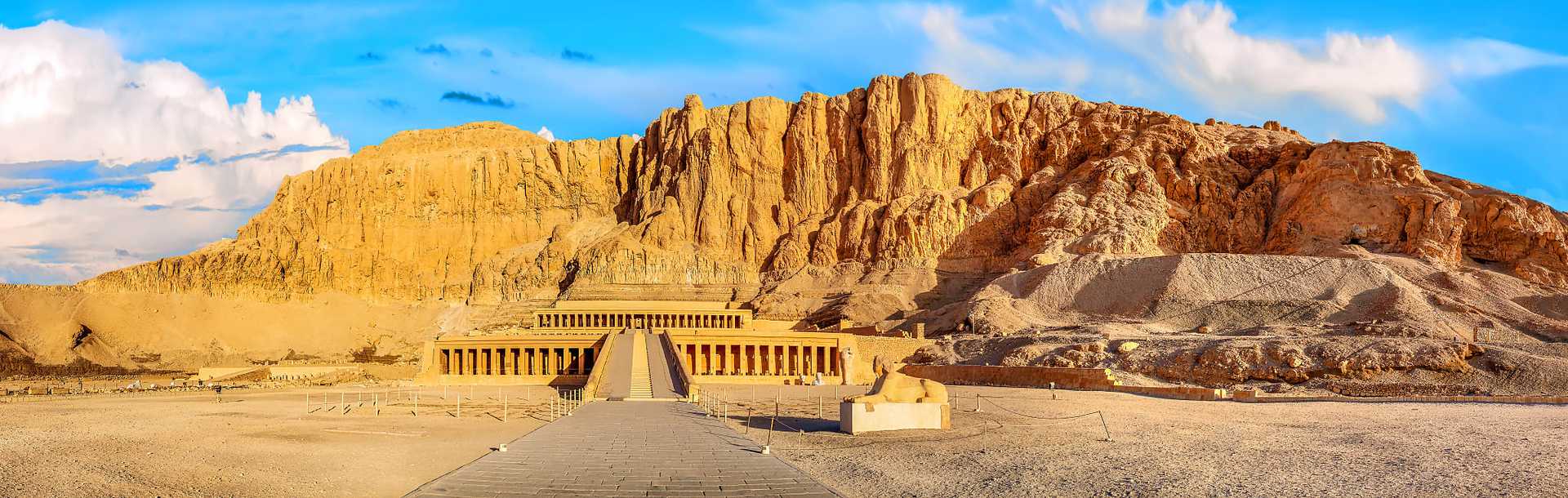 Mortuary Temple of Hatshepsut beneath the cliffs at Deir el-Bahari on the west bank of the Nile near the Valley of the Kings in Egypt.