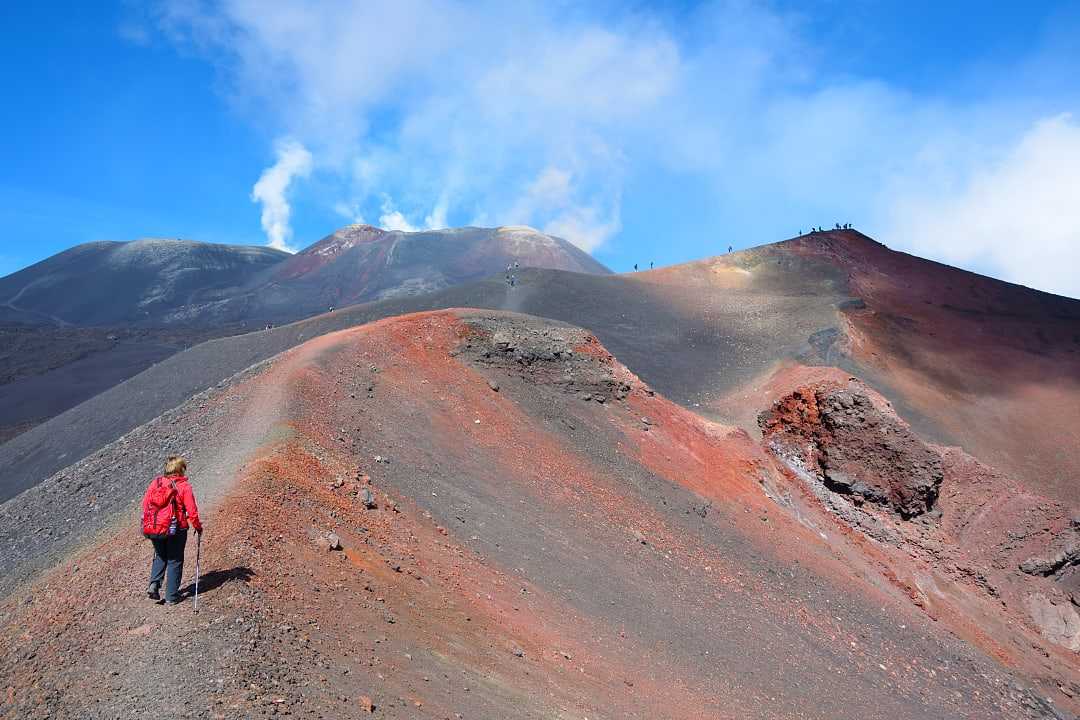 Senior woman hiking Mount Etna in Italy
