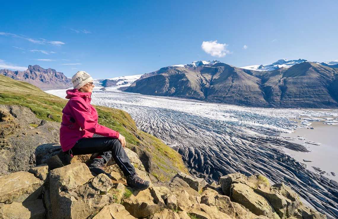 Vatnajokull Glacier in Iceland Senior woman overlooking Vatnajokull Glacier in Iceland