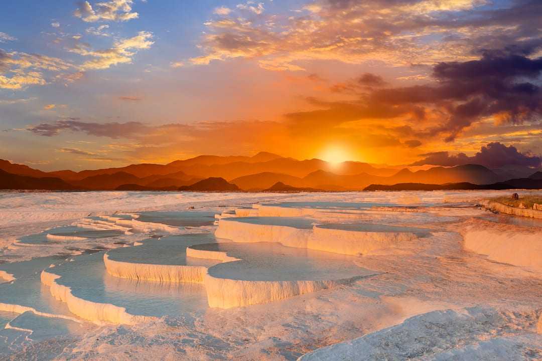Thermal pools at sunset in Pamukkale, Turkey