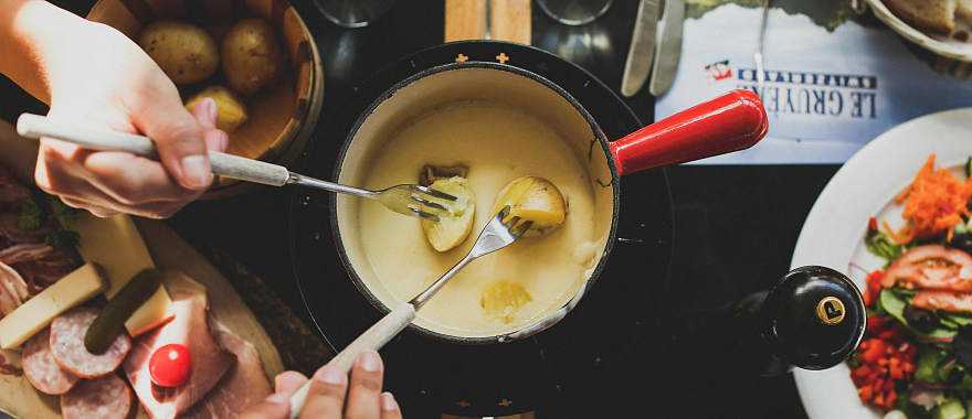 Swiss cheese fondue in Gruyères, Switzerland.