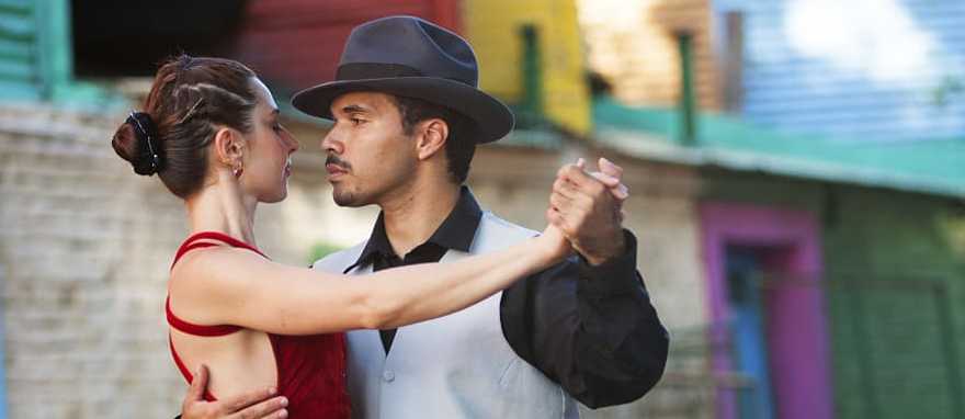 La Boca neighborhood of Buenos Aires, Argentina Couple dancing the tango in the La Boca neighborhood of Buenos Aires, Argentina