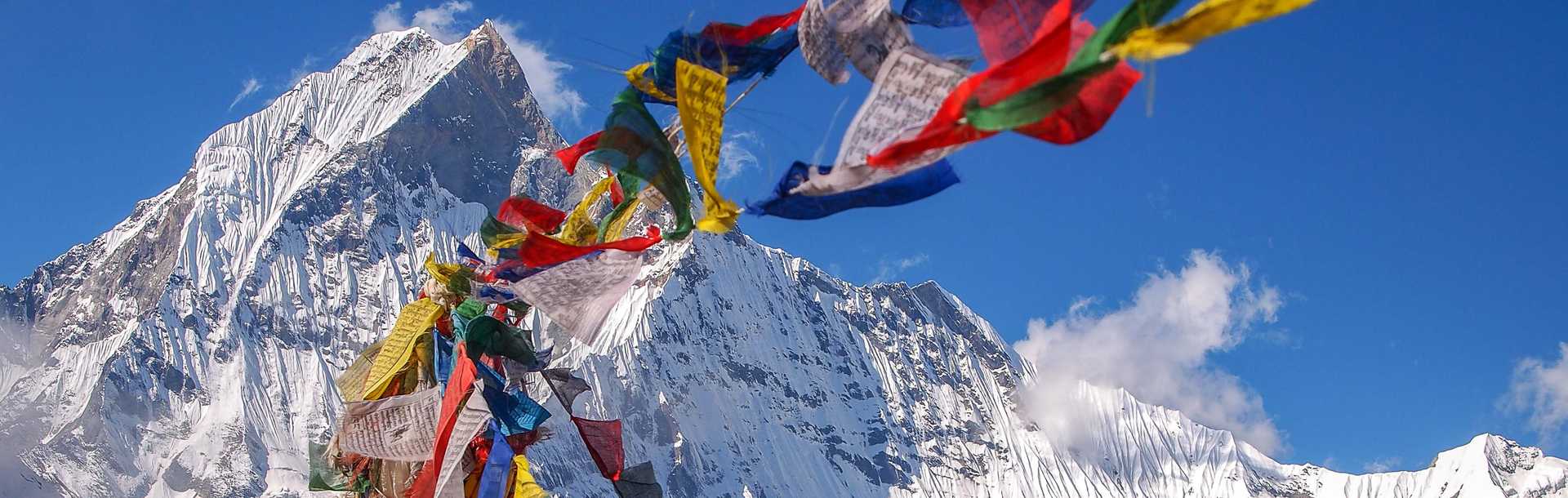 Prayer flags near the summit in the Himalayas of Nepal.