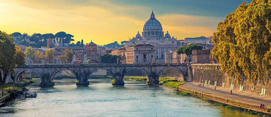 View of the Tiber and St. Peter's Basilica at sunset, Rome, Italy