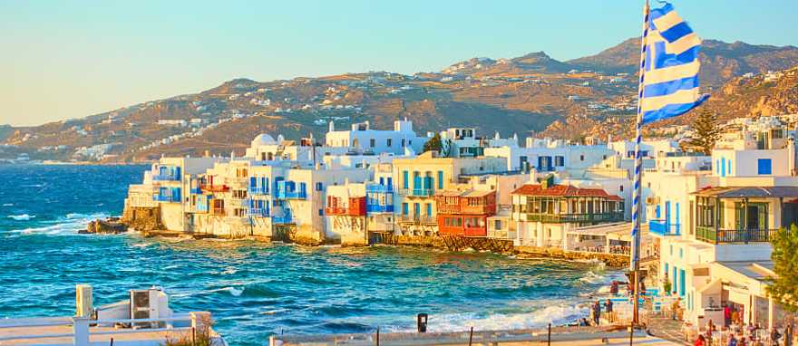 Little Venice, Mykonos, in the rays of the rising sun Little Venice, Mykonos, in the rays of the rising sun