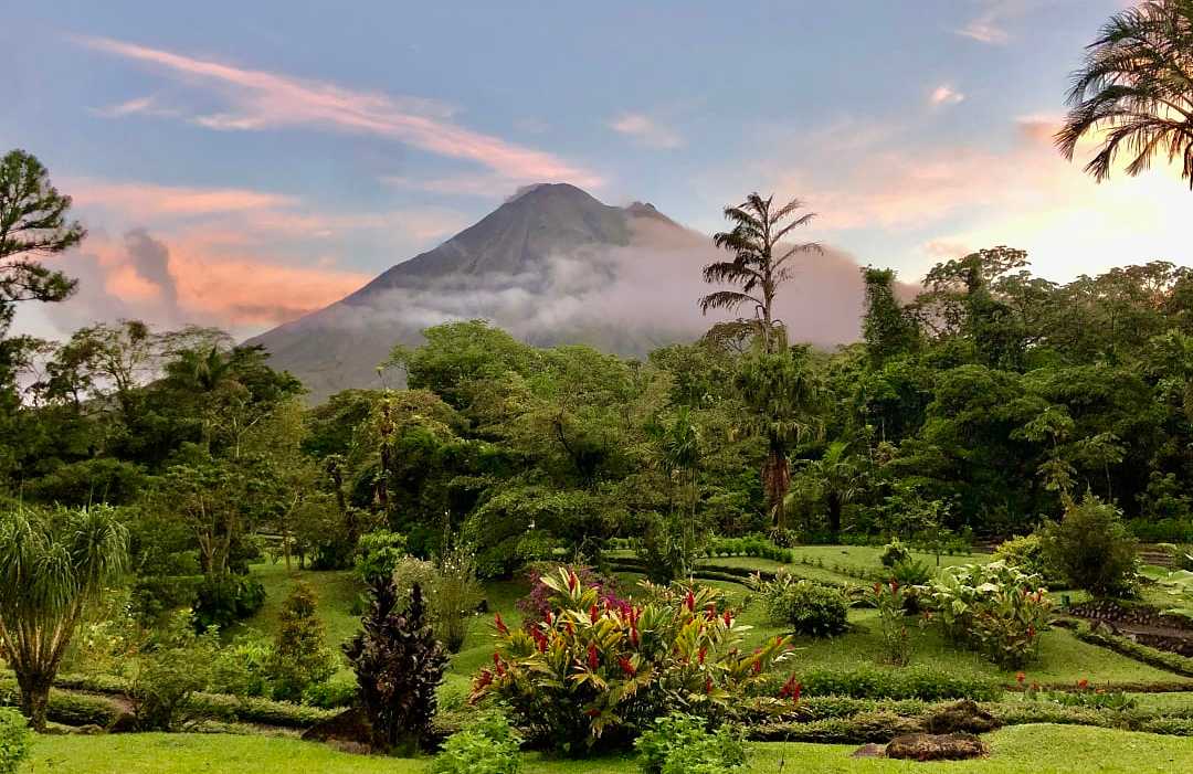 Arenal Volcano, Costa Rica Arenal Volcano in Costa Rica, surrounded by lush rainforest.