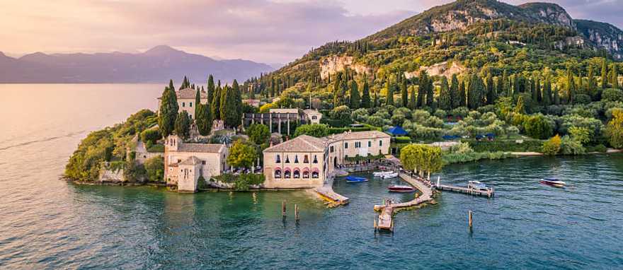 Enjoy breathtaking panoramic views of Lake Garda and the distant mountains.