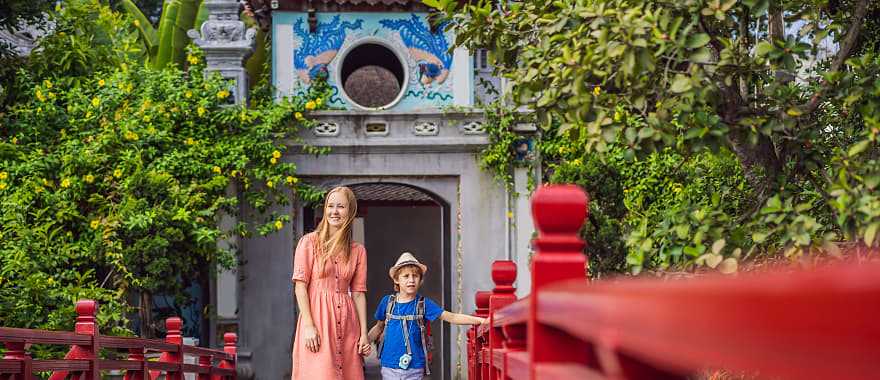 Mother and son on the Hoan Keim Lake Bridge in Hanoi, Vietnam