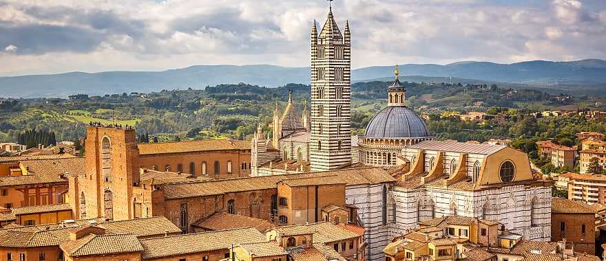 Walk the cobbled streets of historic Siena to explore the preserved walls, palaces and the untouched cathedral.