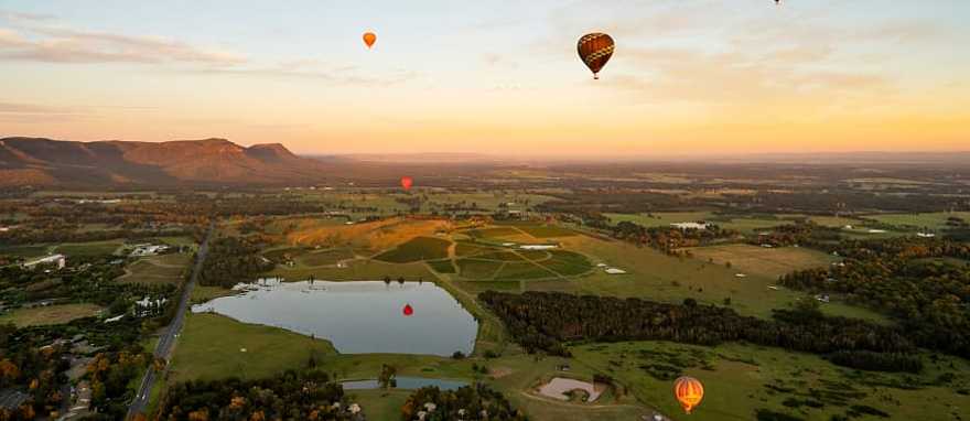 Hot air balloon over Pokolbin in Hunter Valley, Australia Hot air balloon over Pokolbin in Hunter Valley, Australia