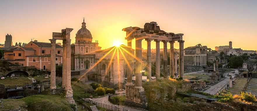 Sun rising over Roman ruins in Italy